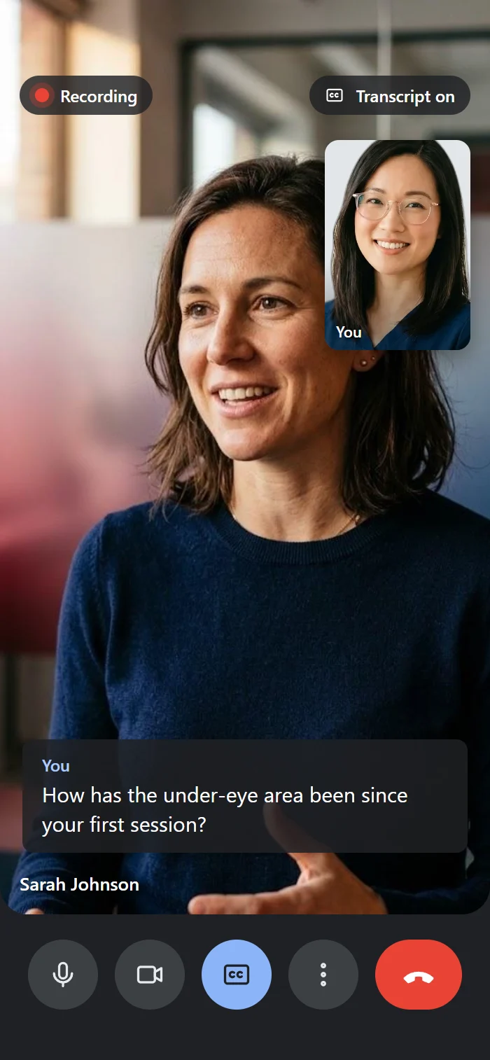 A telehealth visit on a phone: the patient on video, the provider in the self-view tile, recording and transcript on, with live captions.